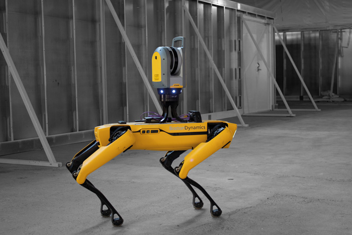 Spot, a Boston Dynamics quadruped robot, inspecting a construction site